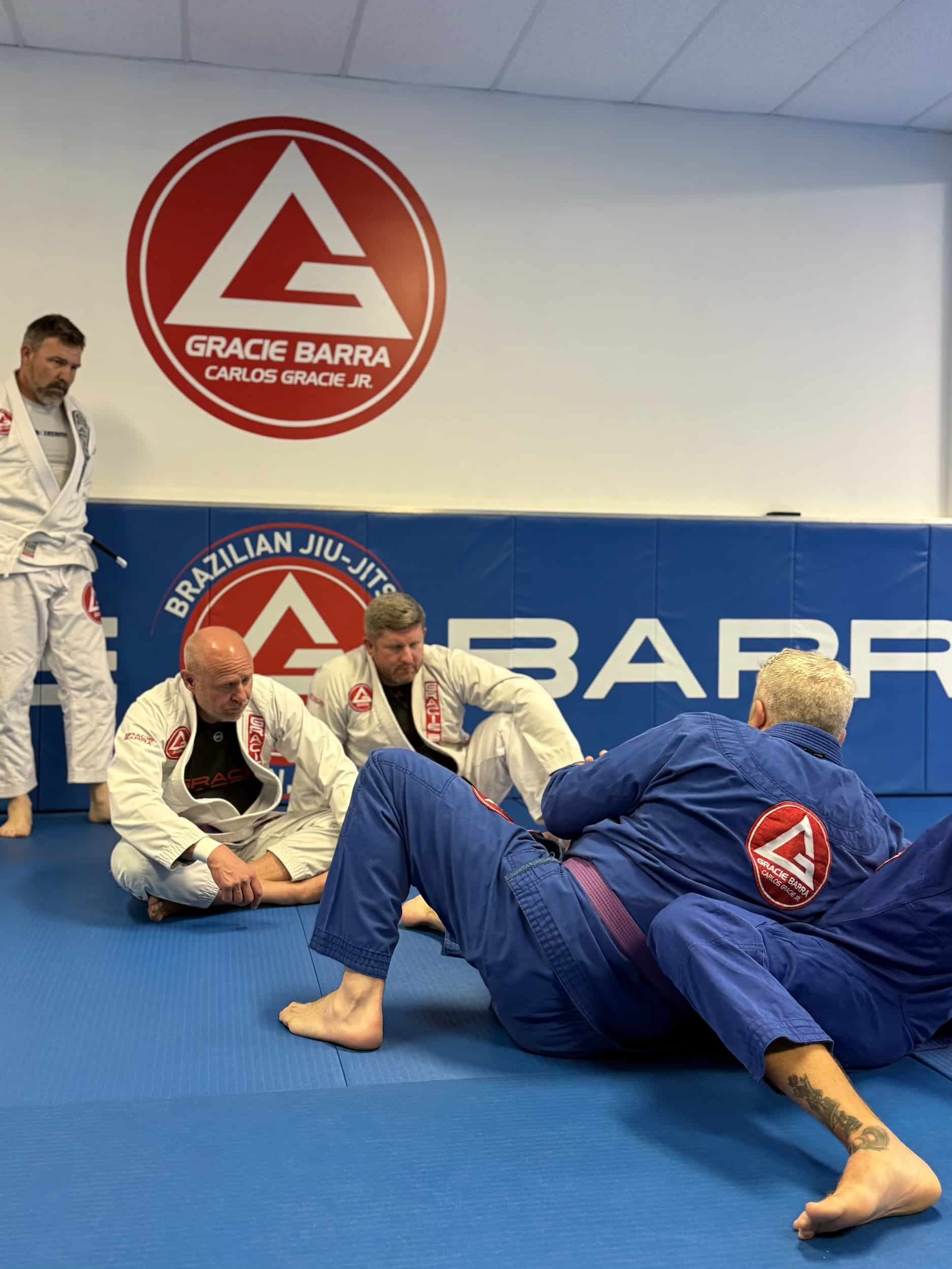 Gracie Barra Anniston instructors demonstrating proper jiu-jitsu techniques